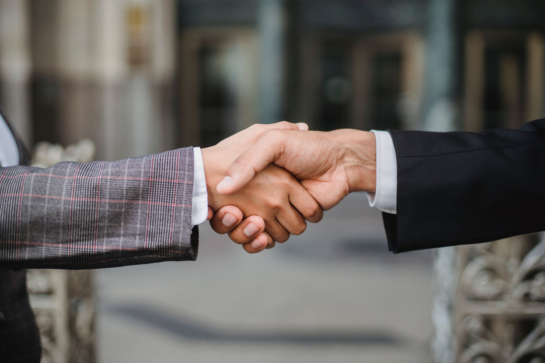 Business handshake — a confidential contractor sale