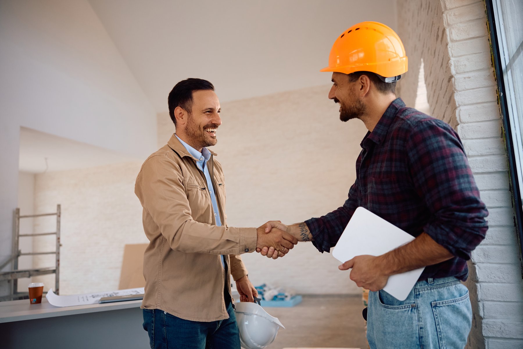 A GeoBrix contractor meeting with a homeowner for a free estimate