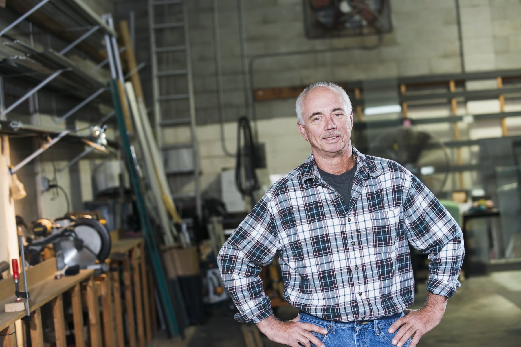Experienced contractor reviewing project paperwork